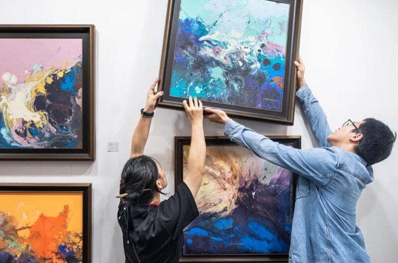 hang art in a gallery