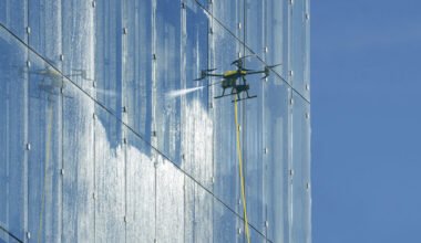 drone building window washing