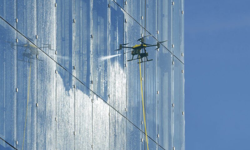 drone building window washing