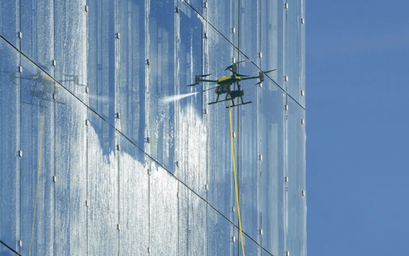 drone building window washing