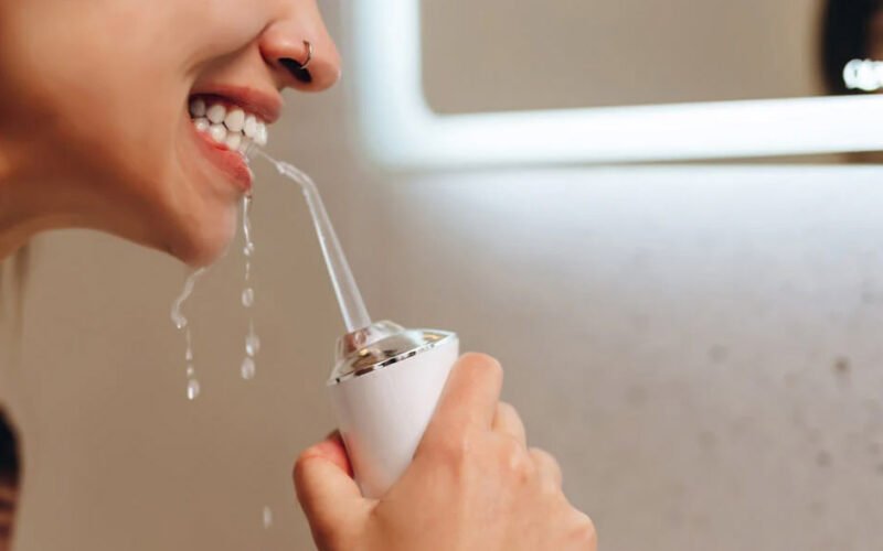 water flosser using
