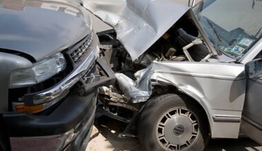 head on collision between car and truck