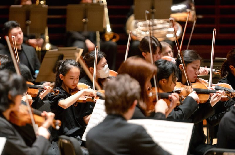 enrolling in a music school at a young age